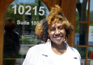 Nailah Queen stands outside a co-op in in Columbia, Maryland, run by women of color