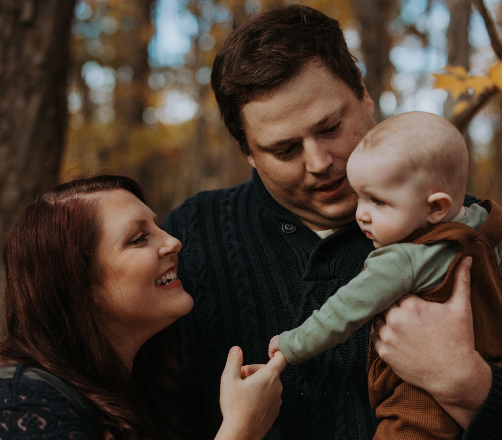 Sarah Haddaway and her husband, Noah, with their son Brooks. (Photo by Jacquie McKenzie/Jacquie Q Photography)