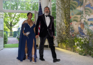 Dr. Janine Bera and Rep. Ami Bera, D-Calif., walk into a State Dinner for South Korea's President Yoon Suk Yeol at the White House Wednesday, April 26, 2023, in Washington. An array of private organizations has underwritten nearly $136,000 for Rep. Bera to bring his wife or child to Copenhagen, Tokyo, Switzerland, Iceland and an opulent resort in Sea Island, Georgia, among other places, trip records show. (AP Photo/Alex Brandon)