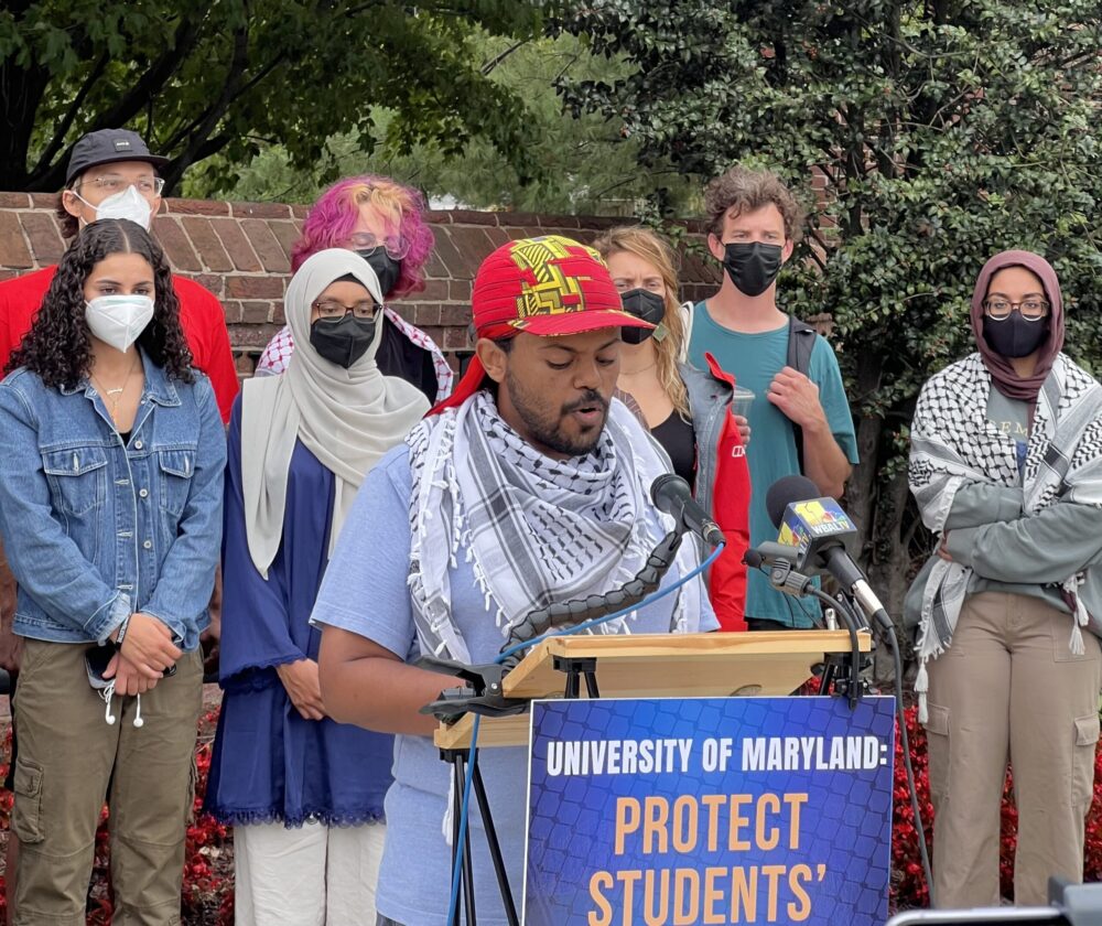 University of Maryland's Students for Justice in Palestine board member Abel Amene speaks from a podium at a press conference on Sept. 17, 2024 announcing the filing of a federal lawsuit against the University of Maryland.