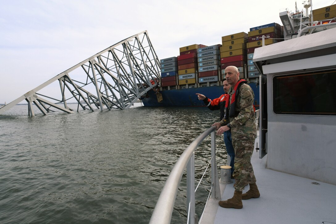 U.S. Army Corps of Engineers Chief of Engineers Lt. Gen. Scott Spellmon surveys the wreckage of the Francis Scott Key Bridge.