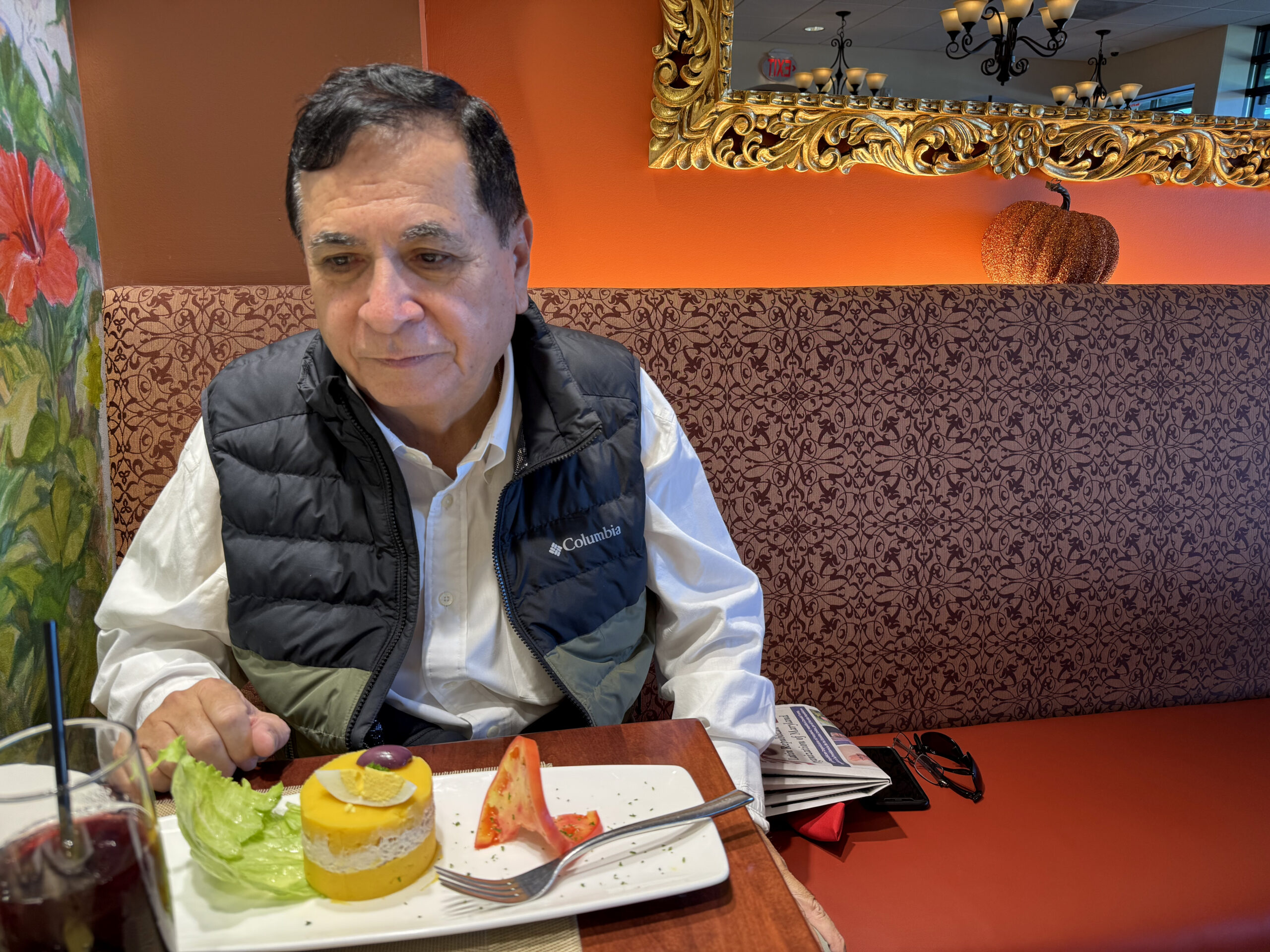 Man dines at a Peruvian restaurant.