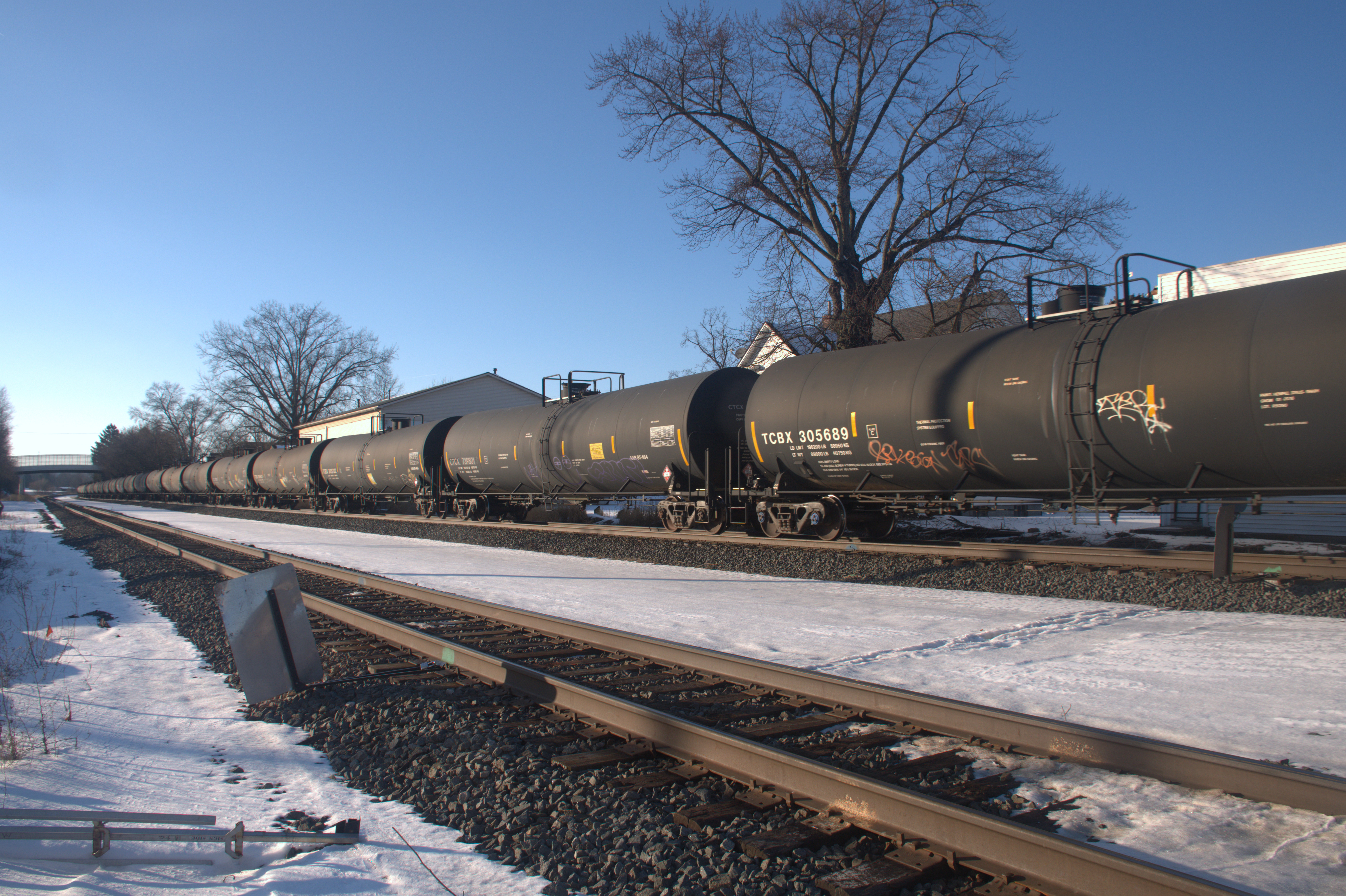 A Norfolk Southern freight train moves through the town of East Palestine, Ohio on Jan. 17, 2025. (Howard Center for Investigative Journalism / Daranee Balachandar)