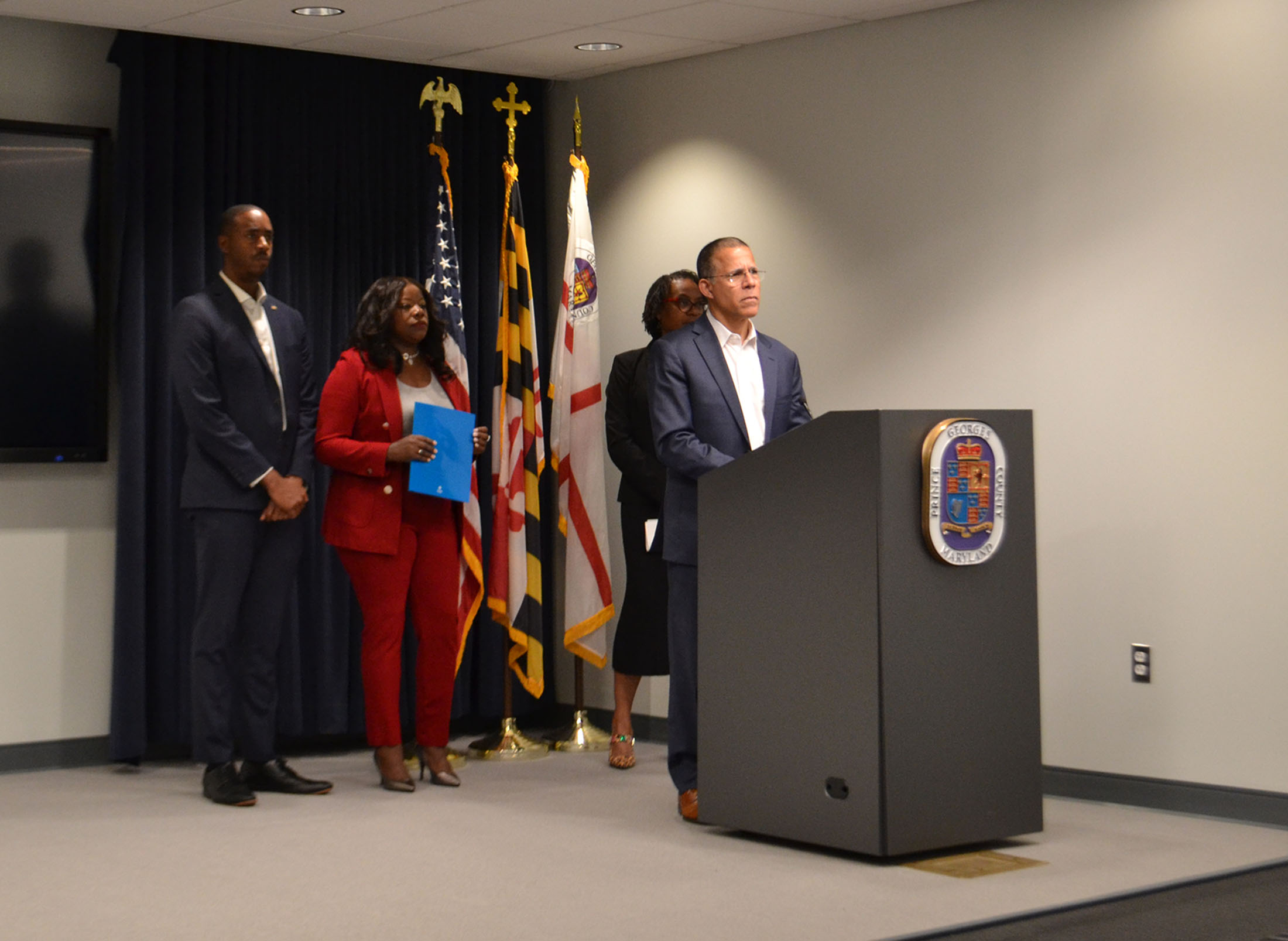 Attorney General Anthony Brown with Prince George's County Executive Aisha Braveboy, Councilmember Edward Burroughs III, and Karen Valentine, deputy chief of the attorney general’s Consumer Protection Division.