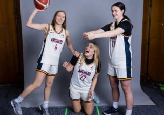 Three players from Cardiff Met women's basketball pose for team's media day