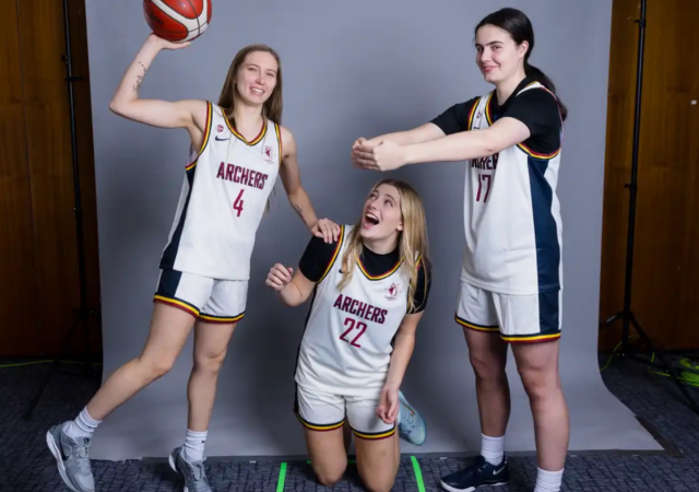 Three players from Cardiff Met women's basketball pose for team's media day